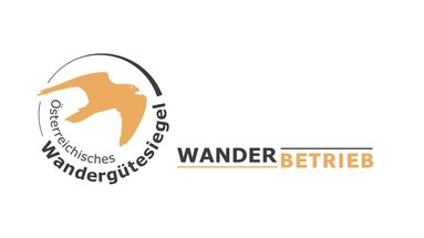 Logo of the Austrian Hiking Seal of Quality – Hiking Accommodation, with an orange stylised bird and black lettering. | © Österreichs Wanderdörfer