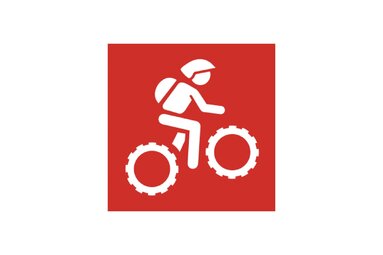 Red pictogram marking an intermediate mountain bike route, showing a person riding a mountain bike. | © TVB Piesendorf Niedernsill